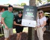 Big Brothers Big Sisters of Broward County board of directors Scott Roberts and Heather Greene with Malena Mendez, president & CEO (center)