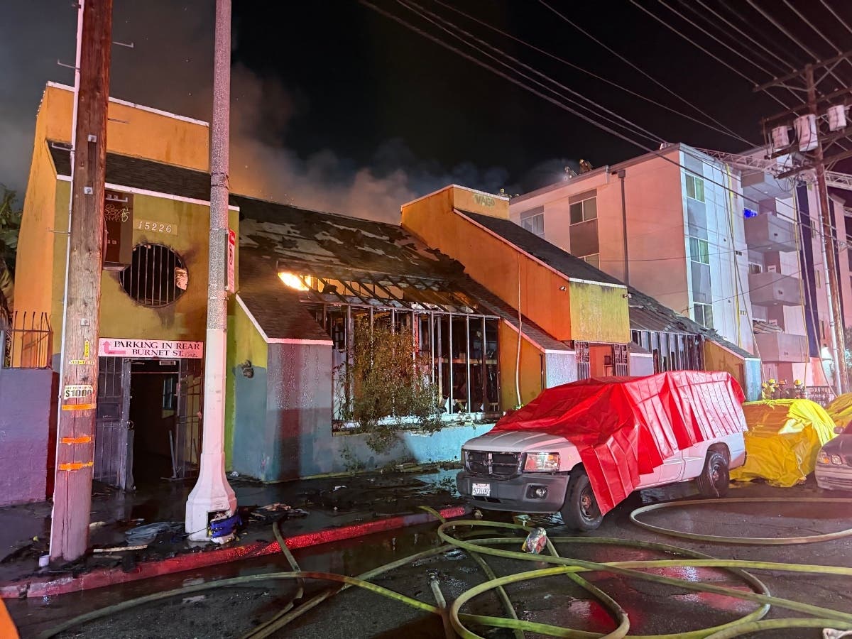 The fire destroyed a boarded-up, two-story commercial building on the 15200 block of W. Parthenia Street, west of Burnet Avenue in North Hills.