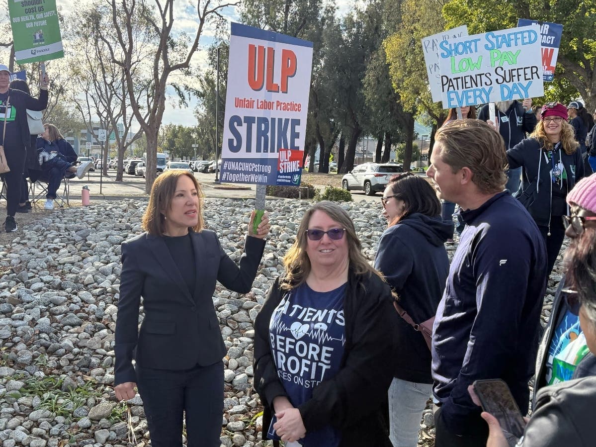 California Lt. Gov. Eleni Kounalakis, left, joined the picket line outside the Kaiser Permanente Riverside Medical Center on Monday morning, alongside UNAC KRNN-UCHP Hospital President Nicole Wooten