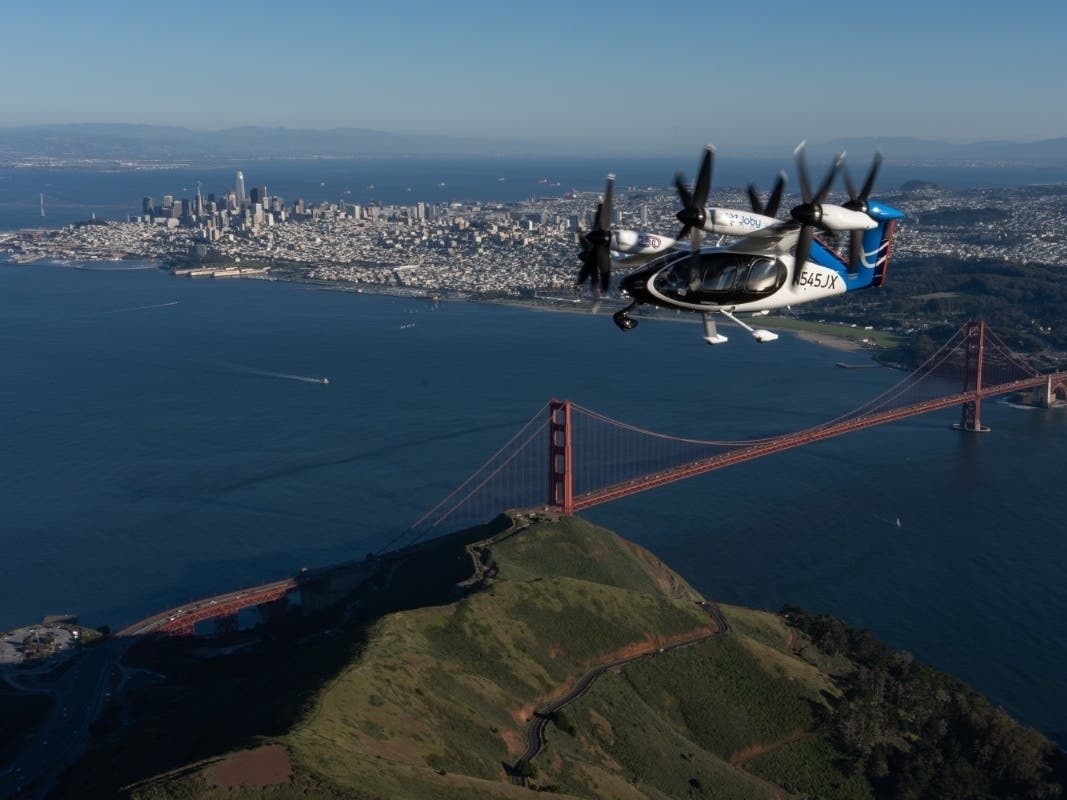 An air taxi flies across the San Francisco Bay on Friday, March 13 as part of testing by Joby Aviation.