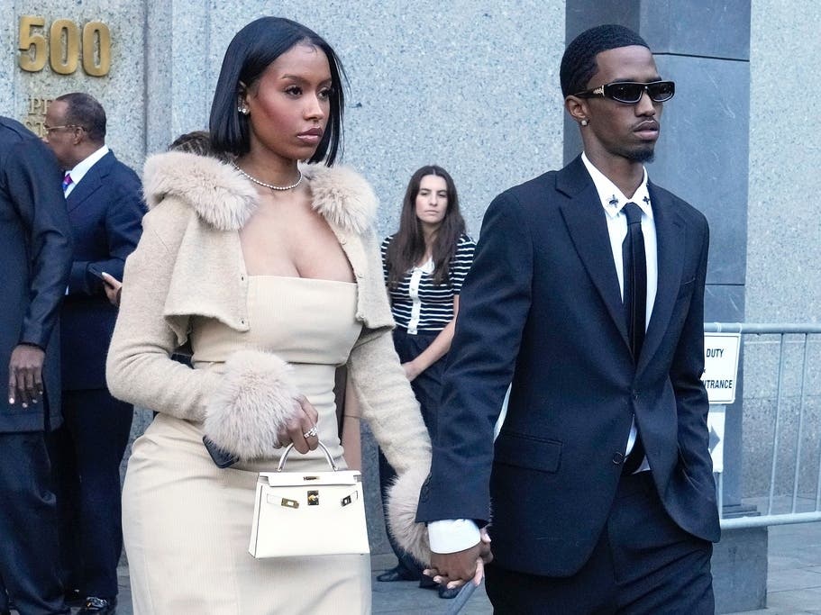 Christian "King" Combs, right, and Raven Tracy leave Federal Court, in New York, Friday, Oct. 3, 2025.