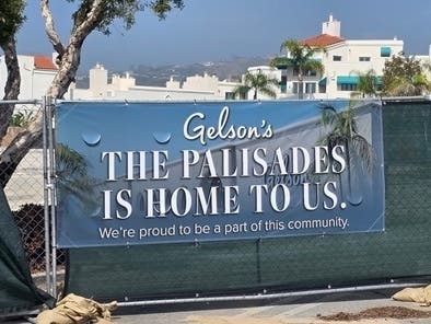 New signs erected on the site of the Pacific Palisades Gelson's indicates the company's plans to rebuild.