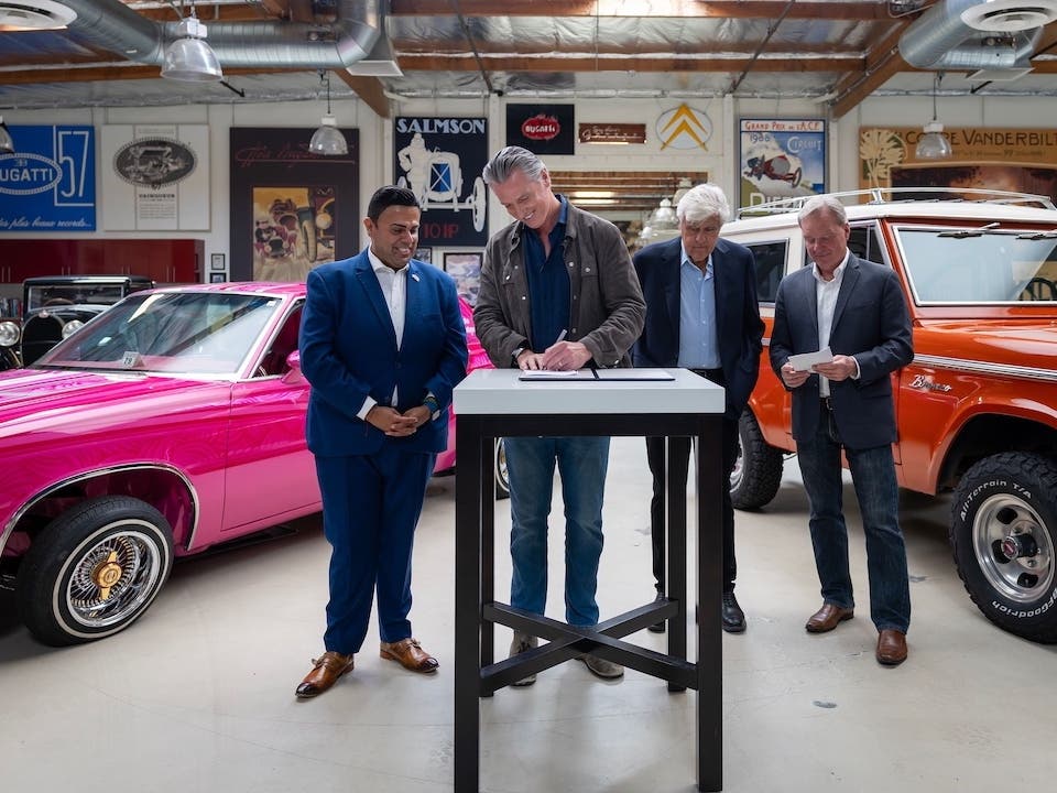 Gov. Gavin Newsom signed Senate Bill 1392, known as "Jay Leno's Law," during a visit to Jay Leno's garage in Burbank.
