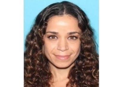 Christina Lynn Downer is described as a 5-foot-1 woman who weighs 115 pounds. She has black hair and brown eyes.