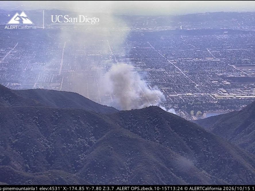 Smoke from the Peak Fire rises above the San Gabriel Valley at around 1:30 p.m.