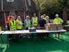 Assemblymember Charles Lavine joins volunteers with Island Harvest food bank to help distribute food to those in need at the Glen Cove Senior Housing Authority apartments in Glen Cove.