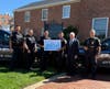 Assemblymember Charles Lavine with Glen Cove Police Department Chief Christopher Ortiz (third from left) and other members of the GCPD, Tuesday, August 25, 2026