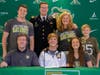 Mark Metz is joined by family at his West Point signing