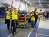 The Buzz Robotics Drive Team celebrates a playoffs match win.