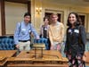 Interns of the 27th legislative district standing next to their assemblymen's, John McKeon's, chair on the house floor. 