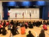 Apex Skip-Its entertain students at Pleasant Grove Elementary School's celebration.