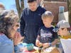 Seth Perlmutter and sons Nathan, age 8, and Jonah, age 5, exploring Teaneck Creek Conservancy native species at NJ Makers Day 2023