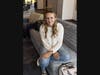 In a photograph taken by Josh Garfinkel, peer mentor Alyssa Nielsen smiles for the camera at the Rutgers Center for Adult Autism Services.