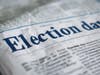The headline of a newspaper reads "Election day."