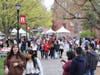 Students, faculty, alumni and community members walking around Voorhees Mall during Rutgers Day 2024.