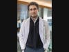 Truman Scholar Omar M. Abuattieh stands in the atrium of the Ernest Mario School of Pharmacy.
