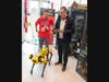 Patrick Rudawski (left), then a grad student, watches Rutgers President Jonathan Holloway operate a robot in Richard L. Weeks Hall during Rutgers Day 2023.