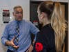Daniel Muhlbach (left) speaks with behavior analyst Courtney Kenney at the Rutgers Center for Adult Autism Services.