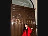 Rutgers-New Brunswick graduate Emily Trujillo stands before the doors of the Sigmund Freud Museum in Vienna in March.