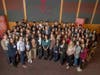 Students participating in the Rutgers Summer Service Internship program gather for a group photo during a kickoff event in May 2023 at the College Avenue Student Center.
