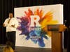 William “Wil” Jones speaks on stage during the Student Organization Reception & Employer Networking Dinner held in Livingston Hall in March.