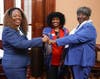 (L-R) Rep. Kim Schofield, Rep. Viola Davis, and Rep. Sandra G. Scott