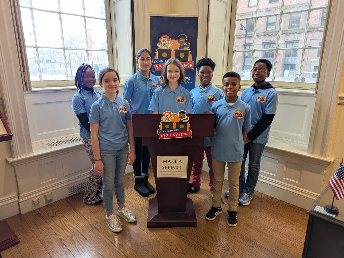 Front Row (left to right): Ajla Reci of Wethersfield; CT's Kid Governor Tessa Hallinan of North Haven; Dylan Ellis of East Windsor. Back Row: Alyvia Stoddard of Stafford; Myra Ruparel of Ellington; Samuel James of Hartford; and Nana Appau of Manchester.