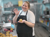 Michela Sorano founder and owner of Baked by Michela prepping sweet delights.