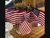 Every new naturalized citizen received a hand flag, flag code, and flag pin