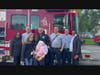 Indiana School fifth grader Toni Rogers was escorted to school by firefighters including Chief Tracy Natyshok (c). She was greeted by her teacher, Ellen Stidham and (l) assistant principal Christina King and (l) principal Tracye Hutsona. 