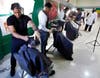 The gym of the Illinois School in Park Forest was turned into a barber shop on Friday, December 8, as barbers from Phipps Academy of Barbering gave free haircuts to students.