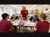 Sergio Nuno speaks with his colleagues at Southland College Prep Charter High School. Nuno is a nominee for the national LifeChanger Award.