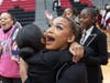 LeiLani Barnes is embraced by a teammate as the Southland Dancing Lady Eagles celebrate their sectional championship victory.