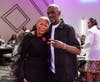 Dr. Blondean Y. Davis, left, shares a moment with former Chicago Bulls player Craig Hodges during the America's Big Sisters Foundation's 9th Anniversary Champions for Youth Awards Luncheon at Wind Creek Casino in East Hazel Crest.