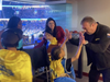 6-year-old Isaiah Gives Good Greek CEO Spero Georgedakis a High-Five