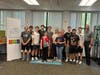 Volunteers from The Church of Jesus Christ of Latter-day Saints with Mercer Street Friends CEO Randall West.
