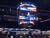 National anthem captioning on giant-hung video scoreboard and ribbon boards during New York Liberty pro women basketball game at Barclays Center, Brooklyn New York