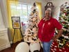 A decorative white Christmas tree display sets the scene for the holiday festivities at Lake Forest Park.