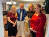 Joyful smiles and high spirits fill the atmosphere as community members and residents celebrate the festive event.