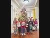 Children from Precious Lambs KIDDIE KOLLEGE share Christmas carols in appreciation of Lake Forest Park's toy donation drive.