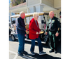 Sheriff Del Toro takes time to connect with residents near the community’s golf cart during his tour.