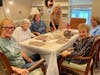 Residents of Juniper Village at Paramus enjoy some quality time with their families for Grandparents' Day. 