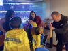 6-year-old Isaiah gives Good Greek Spero Georgedakis a High-Five
