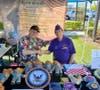 Gary Scaife (left) and Vincent Palmieri, Jr. (right), greeted visitors at the Veteran Resource Fair. Scaife is a Navy veteran, and Palmieri is a Marine Corps veteran and the commander of the State of Nevada’s Military Order of the Purple Heart.  