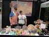 Gary Scaife and Kris Cesena of Help R Heroes showcase gift items designed and handcrafted by veterans at the MCON 2024 military convention.