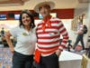 Asal "Vox" Gibson of Help R Heroes and Vincent Palmieri Jr., commander of Nevada's Military Order of the Purple Heart, take a break from bowling at the MOPH's Halloween Bowl-a-Thon Fundraiser.