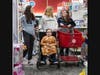 Haddonfield Memorial Leo Club members shop with children from the NJ Commission for the Blind.