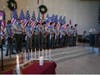 Scoutmaster Andy Johns honors the Eagle Scouts he helped mentor, after each received their medals and ceremonial neckerchiefs.