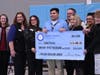 Visitors from the Colorado Department of Education and Greeley-Evans School District 6 congratulate ELA and CLD teacher Caleb Flores on his Milken Educator Award.