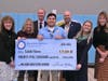 Veteran Milken Educators give Caleb Flores a warm welcome to the family.